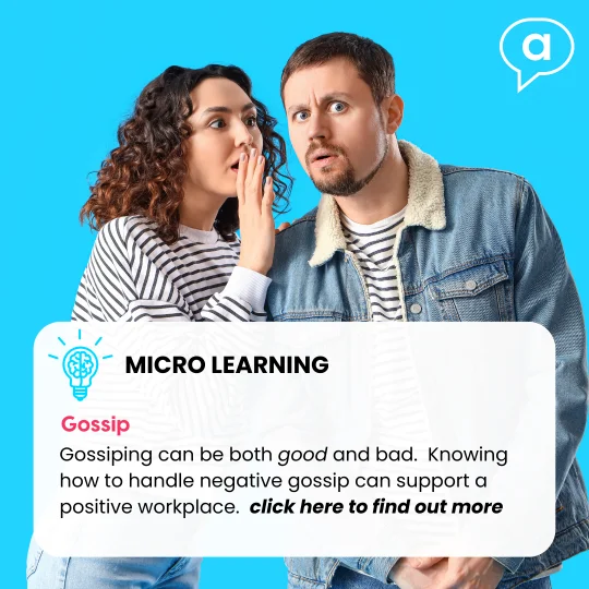 Stock image of a female and male. The female is whispering into the males ear.